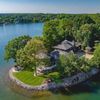 An aerial view of a Vrbo beside a lake in Charlotte