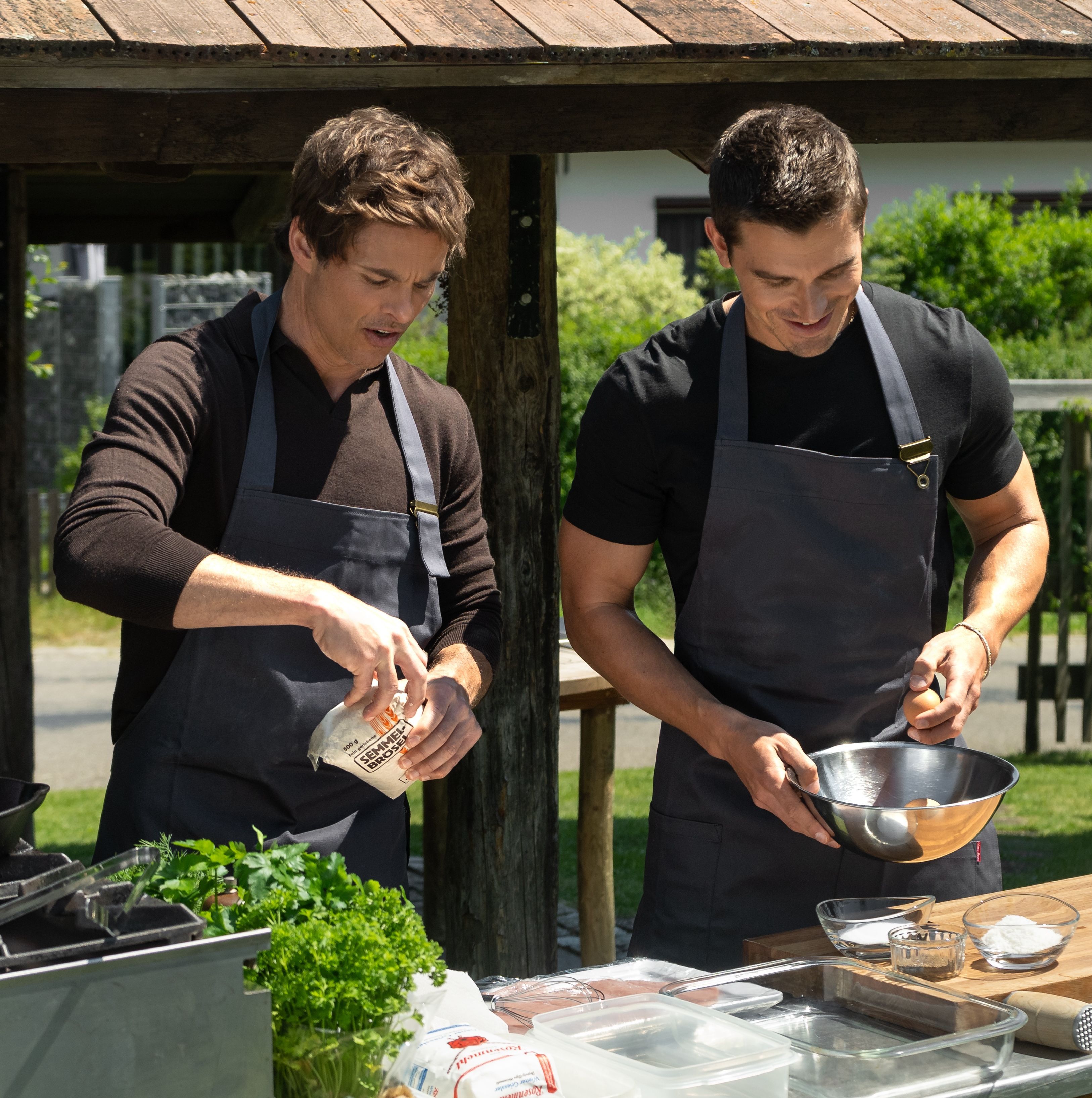 Antoni Porowski leads a schnitzel-making session with James Marsden. Photo: National Geographic/Rebecca Eishow