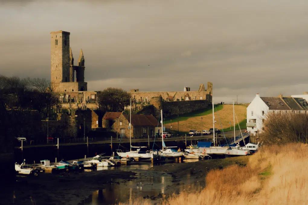 A view across the harbor to the ruins of St. Andrews Cathedral, St Andrews, Scotland