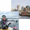 Captain Paul Kim holds a fish he's just caught; a view of the Seattle Great Wheel from the water