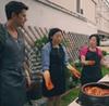 Antoni Porowski and Awkwafina get a lesson in kimchi. Photo: National Geographic/Seong Joon Cho