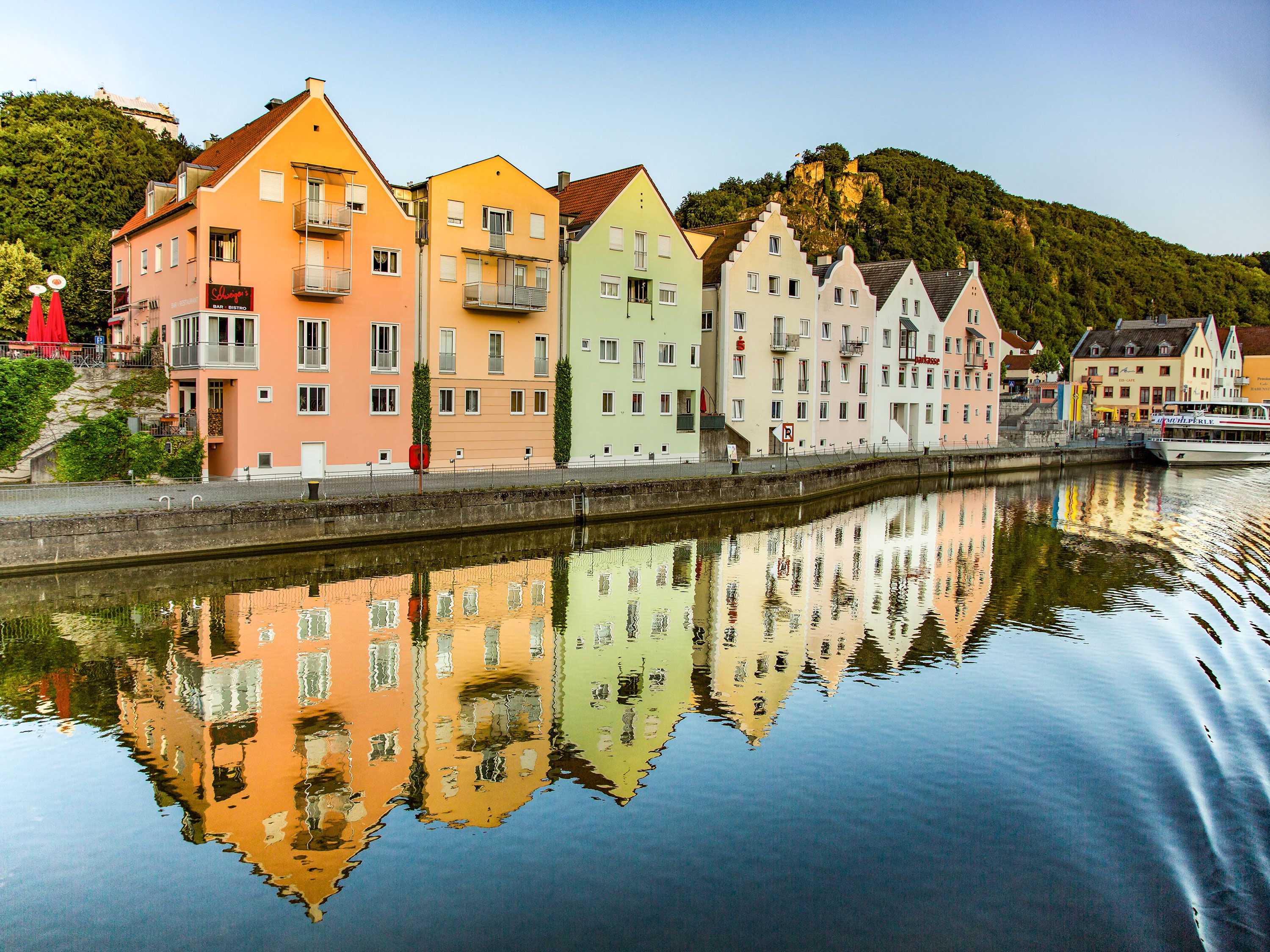 Colorful apartment buildings reflected in the Danube River near Nuremberg, Germany