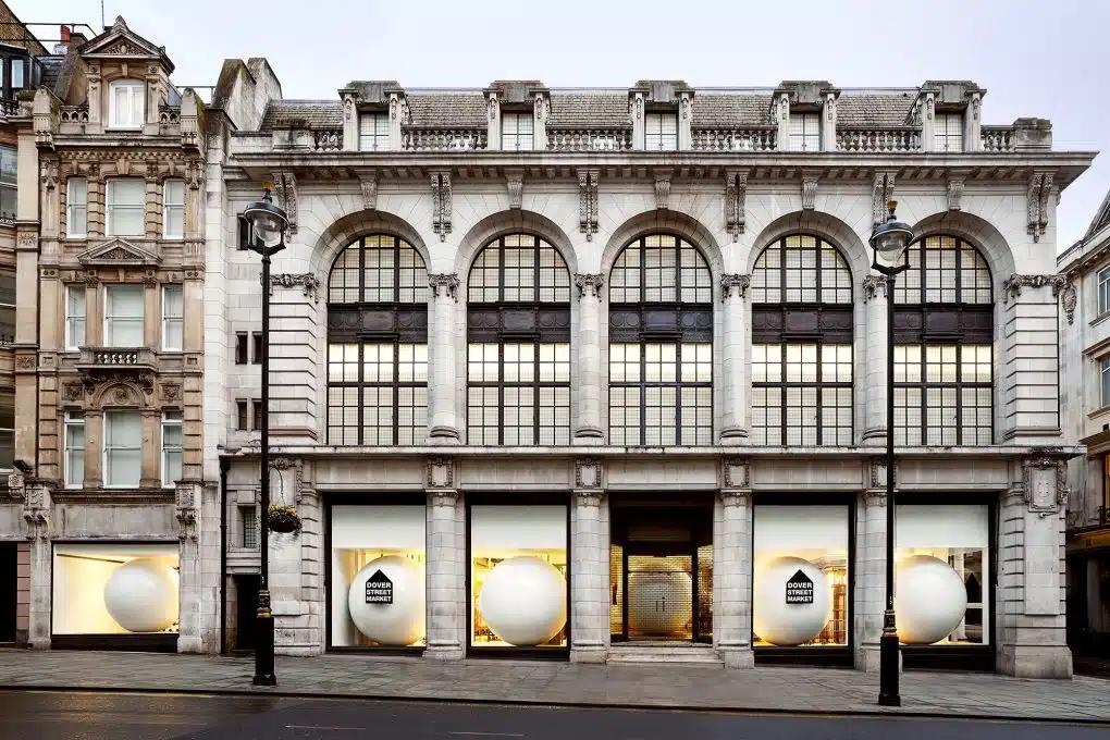 Giant white balls form the window displays at London's high-end fashion store, Dover Street Market