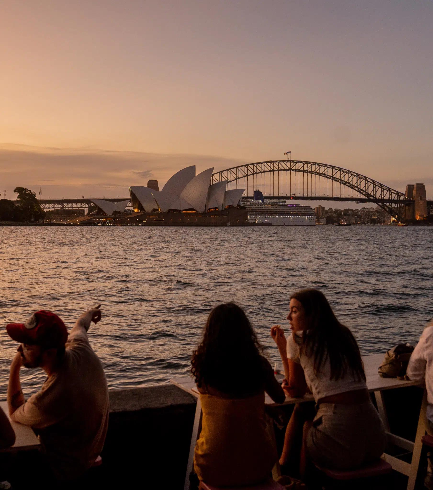 Sydney Opera House and Sydney Harbour Bridge seen from across the water 