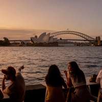 Sydney Opera House and Sydney Harbour Bridge seen from across the water