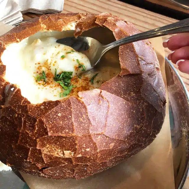 Clam chowder in a sourdough bread bowl, a signature San Francisco dish