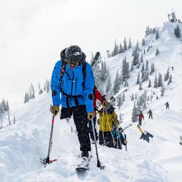 Skier and accessibility activist Vasu Sojitra on a snowy mountain
