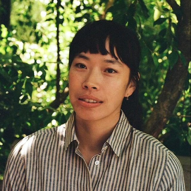 Photographer Aysia Stieb wearing a striped shirt