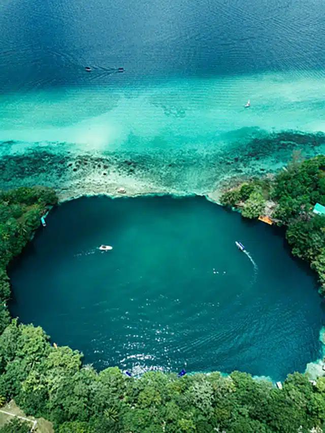 The turquoise waters of Cenote Negro in Bacalar, Mexico