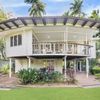 The curved upper floor deck of a Vrbo in Darwin, Australia