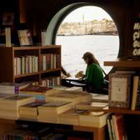 The giant porthole window at Karaköy Kitapçısı bookshop, Istanbul