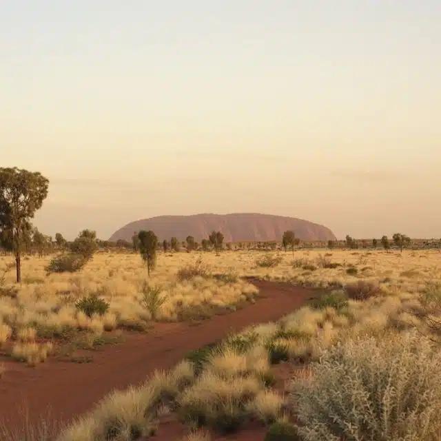 Uluru, formerly known as Ayer's Rock, seen from across the desert, in the Northern Territory, Australia