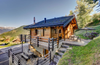 A Vrbo rental chalet built into the hillside of La Tzoumaz, Valais, in the Swiss Alps