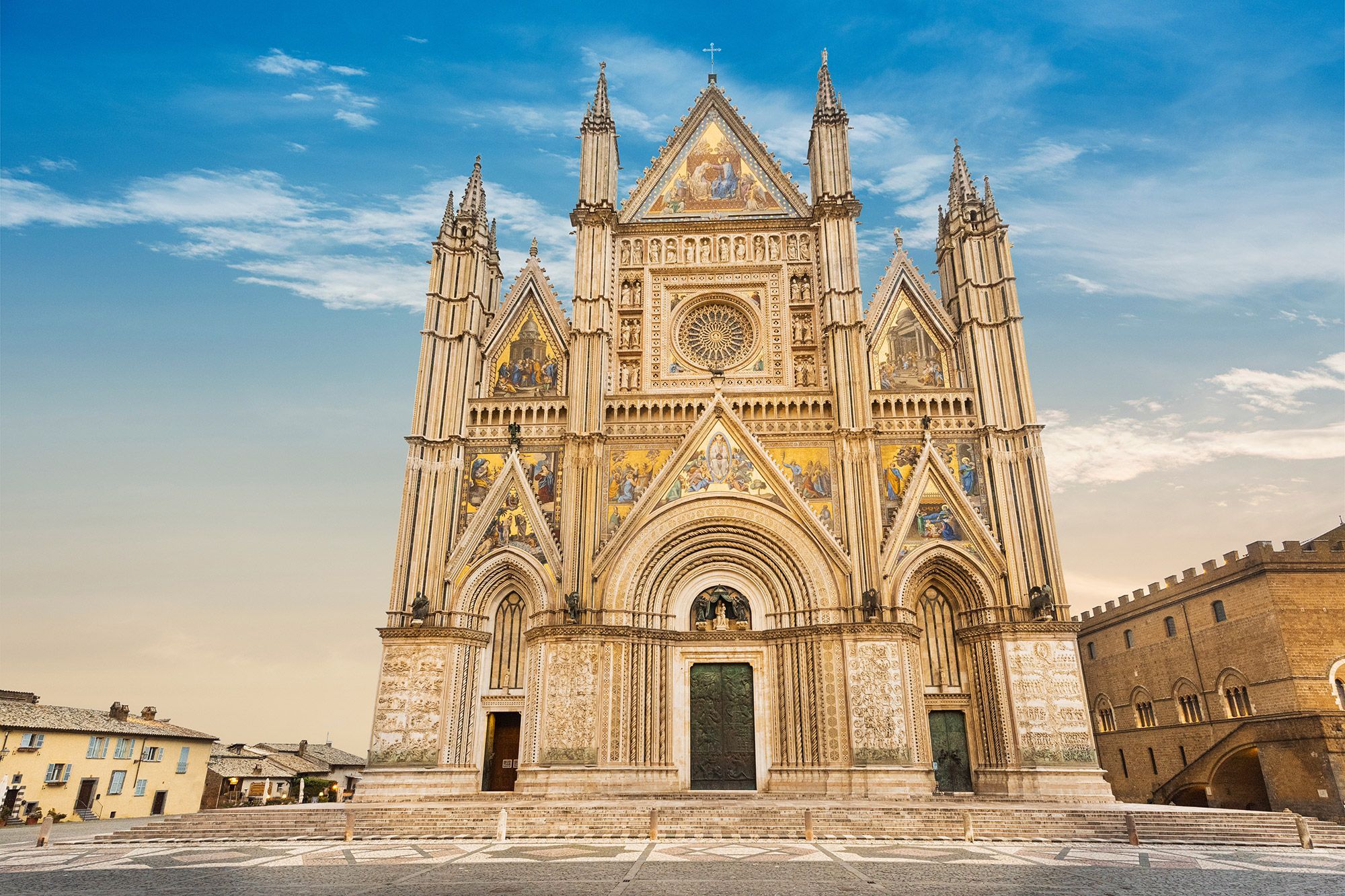 Exterior view of Orvieto Cathedral in the cathedral square in Orvieto, Italy.