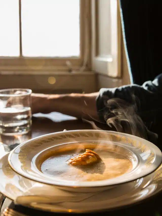 A steaming bowl of lagoustine soup in a pretty patterned bowl