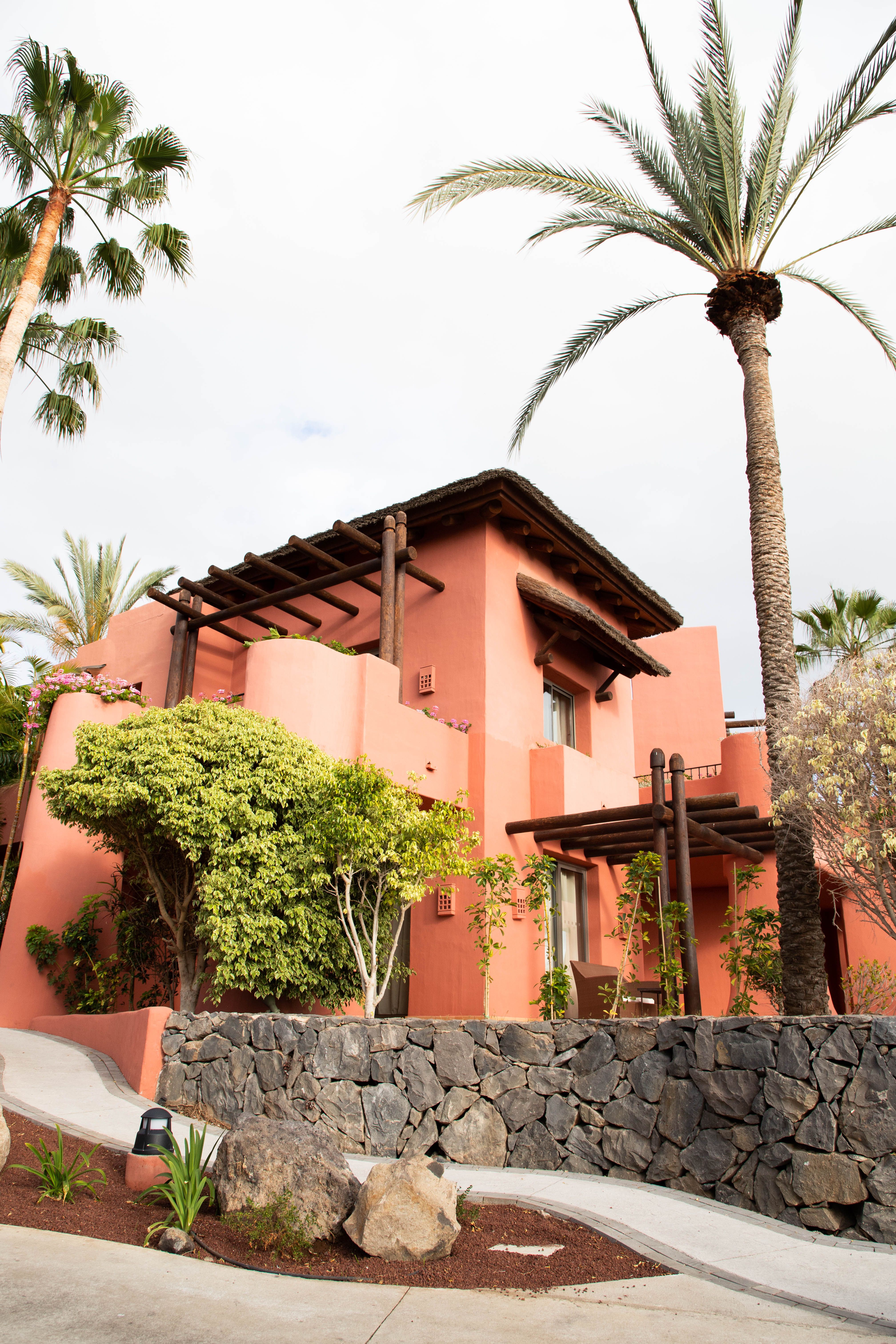 A pink building of the Ritz Carlton