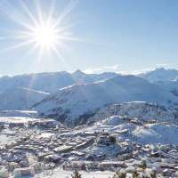 An aerial view of Alpe d’Huez on a sunny day