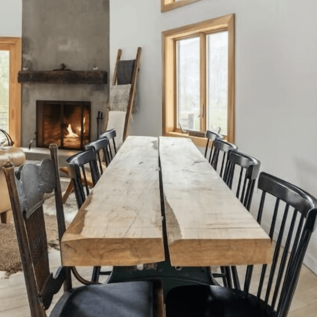 A long rustic dining table in the Willow Silo, a Vrbo near Woodstock