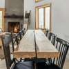 A long rustic dining table in the Willow Silo, a Vrbo near Woodstock