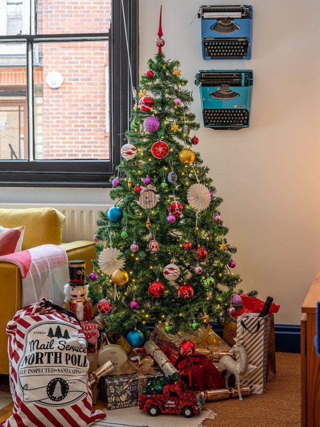 A Christmas tree decorated with colorful baubles