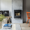 A log burner in a modern living room of a Vrbo in Somerset