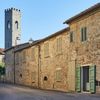 The stone frontage of an elegant Vrbo in Poderi, Tuscany, Italy