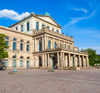 Hannover’s neoclassical Staatsoper under a bright blue sky