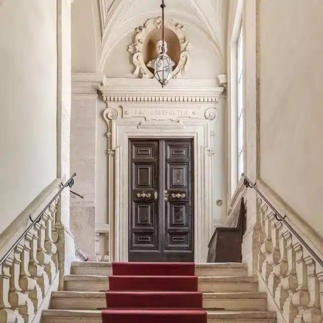 The staircase of a grand apartment in Rome