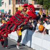 A Vietnamese dragon greets the crowds that line the street for the Tết Parade in Westminster, CA