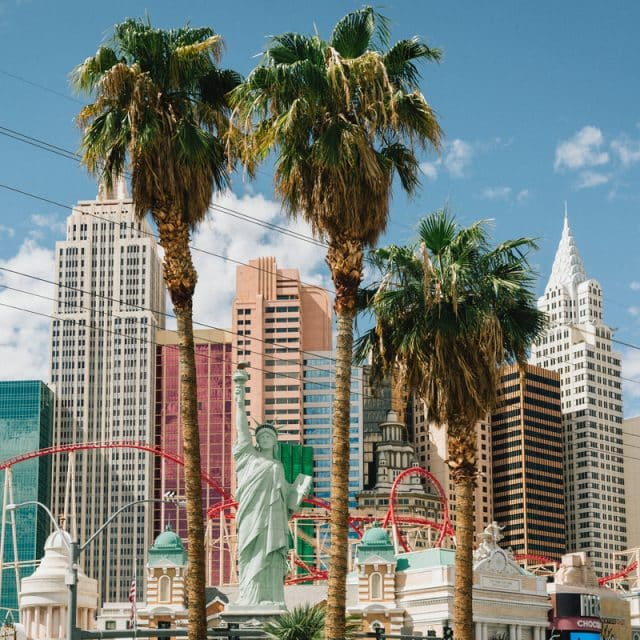 The Statue of Liberty replica and skyscrapers of the Las Vegas city skyline