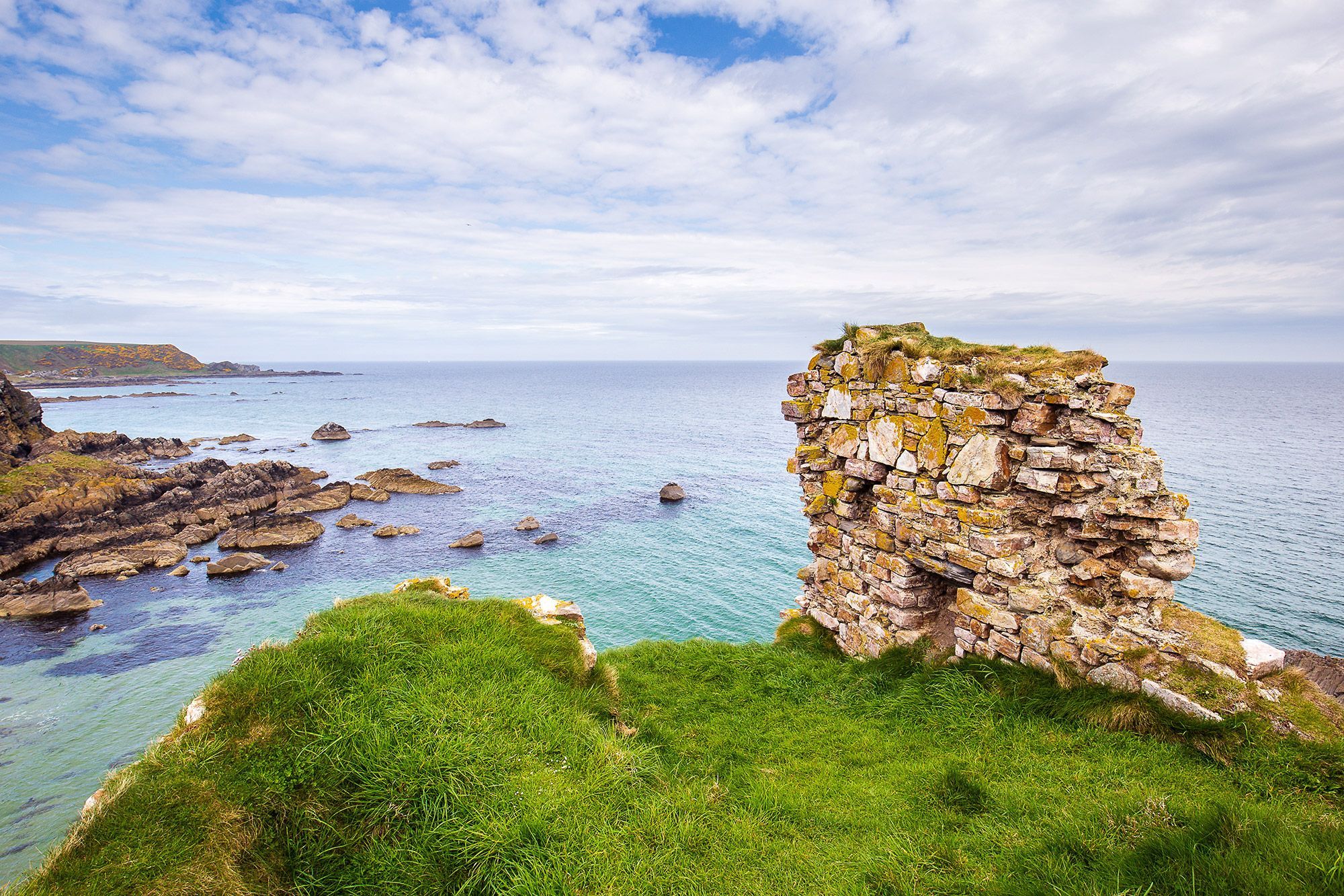 Ruins of the Findlater Castle overlooking the water in Scotland.