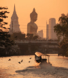 The giant Buddha statue of Wat Paknam Phasi Charoen temple in Bangkok, seen from the water