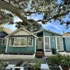 A one-story, blue-painted Vrbo in Monterey Bay, where John Steinbeck lived