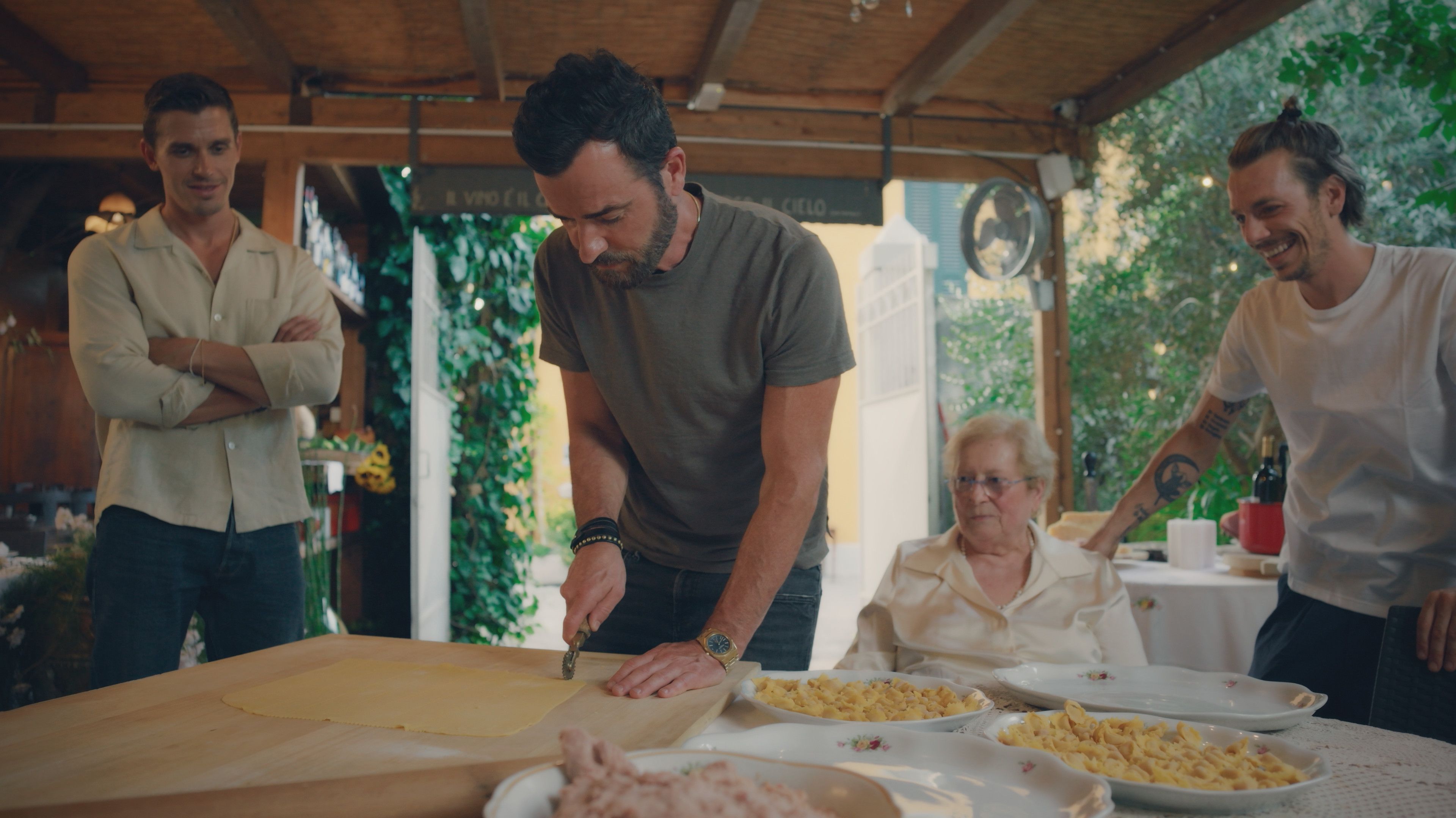 Antoni Porowski with Justin Theroux, learning to make tortellini in brodo. Photo: National Geographic/Rebecca Eishow