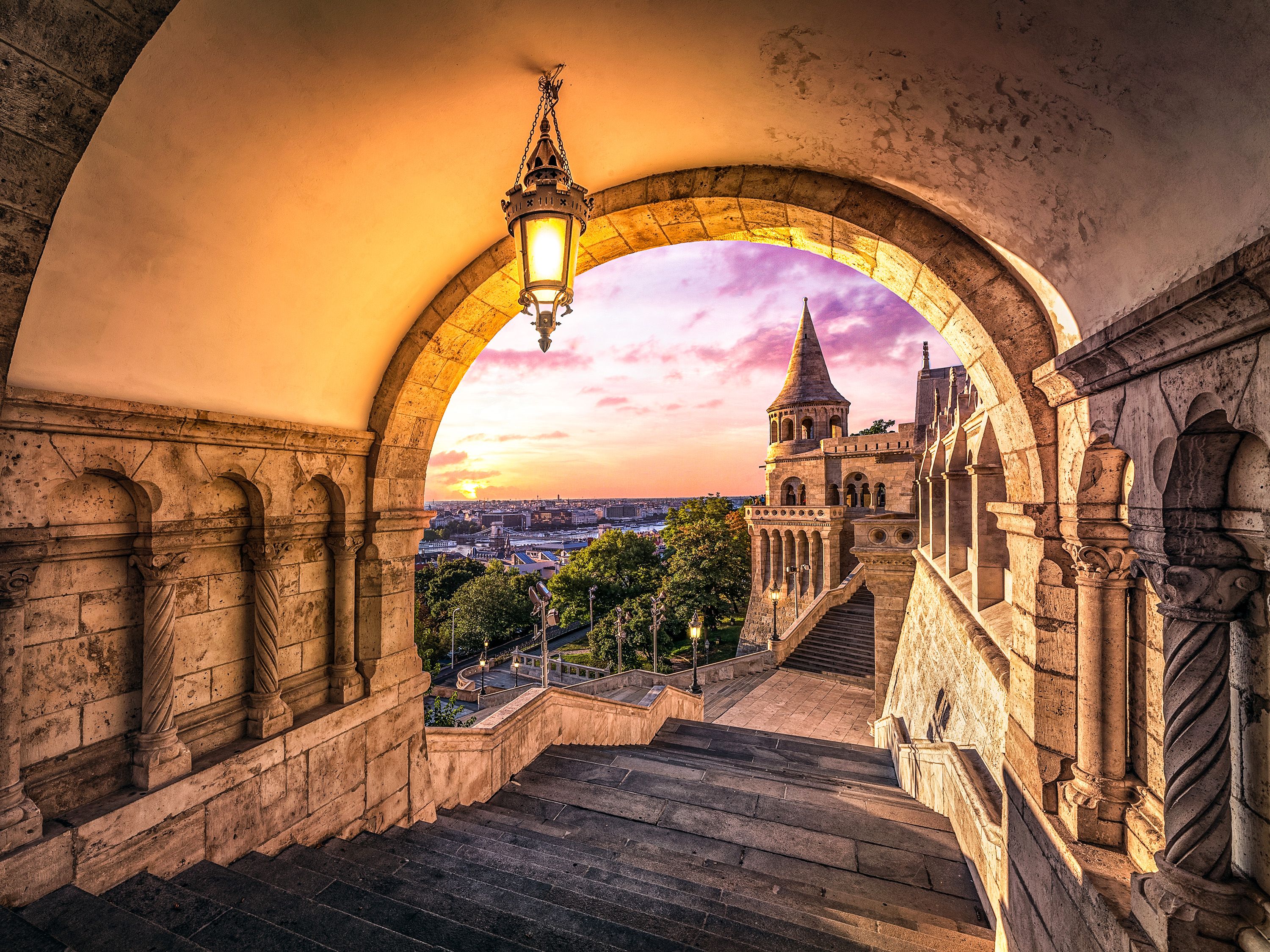 Stone-covered pathway leading to Fisherman’s Bastion at colorful sunrise in Budapest
