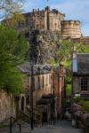 Edinburgh’s Vennel Steps with castle and blue sky in background
