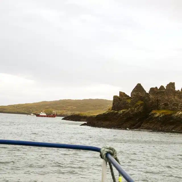 Seen from a boat, the 17th-century ruins of Cromwell's Barracks
