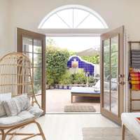 French doors open out to a beautiful patio
