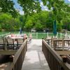 A large raised deck with loungers at a Vrbo on Lake Lure