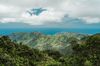 Mount Kaʻala of the Waianae mountain range in Oahu with sun and clouds.