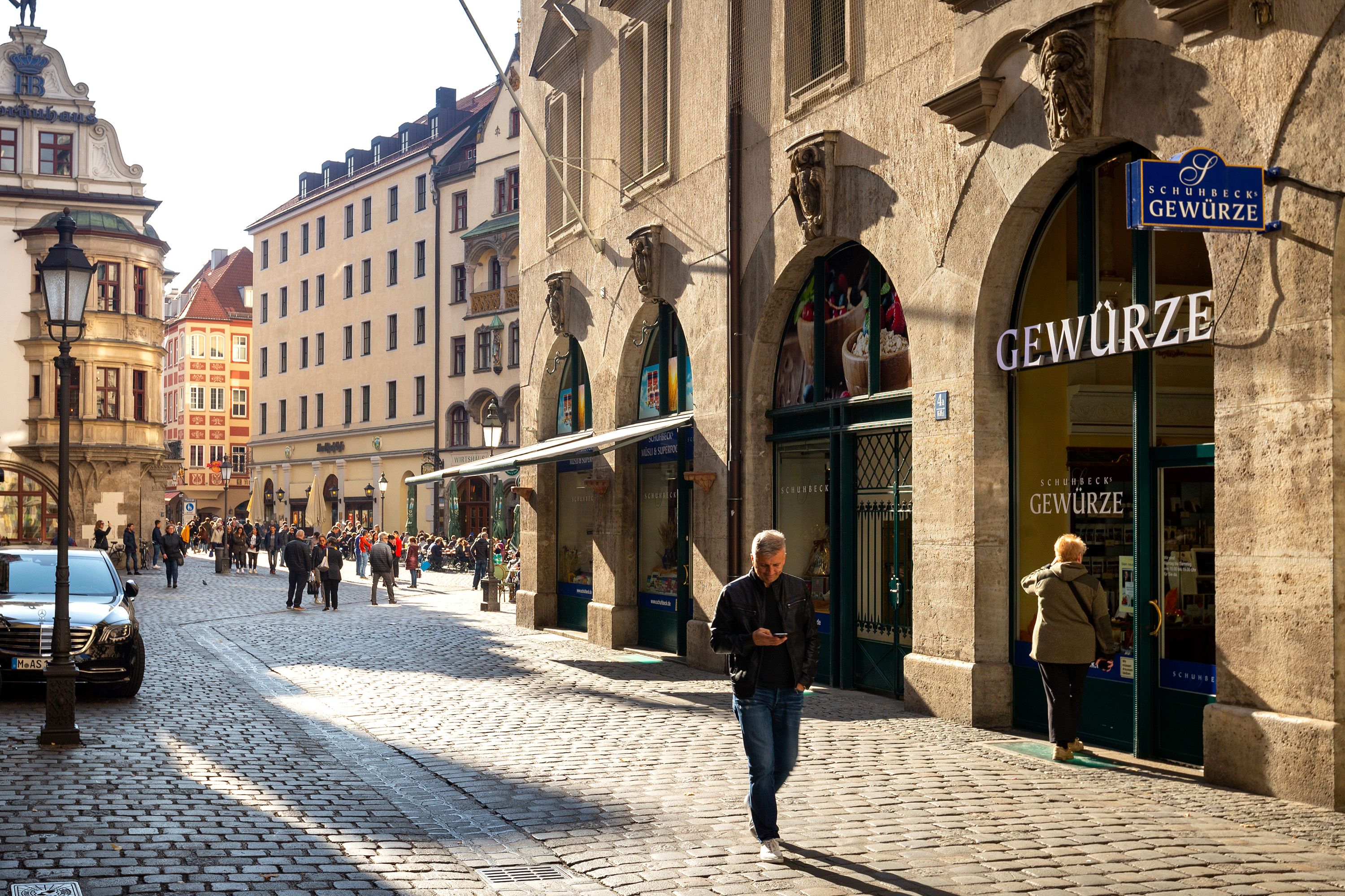 Streets made of brick lined with shops and businesses.