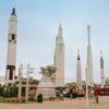 Visitors admire rockets on show at the Kennedy Space Center