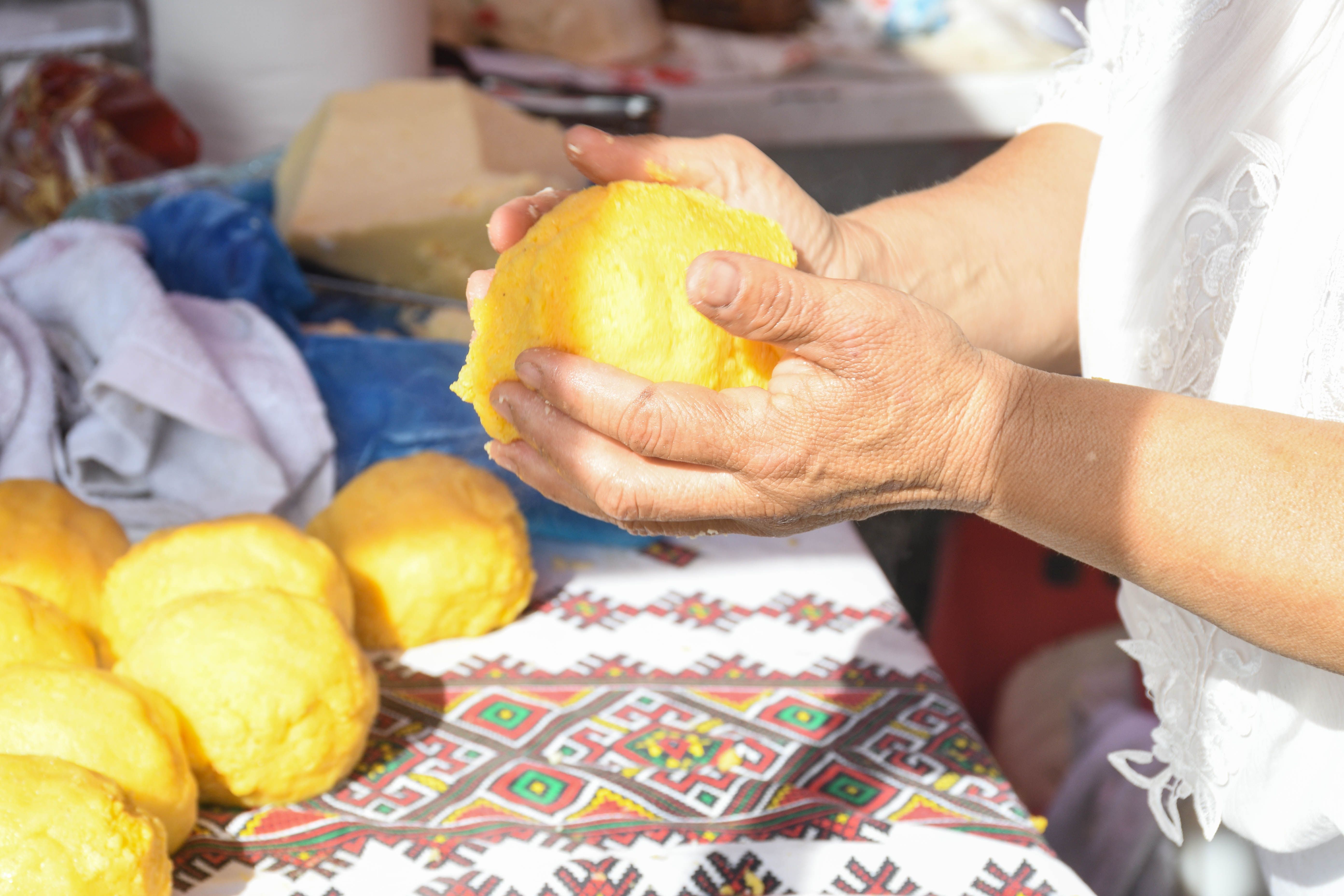 Bulz, a traditional dish, balls of polenta with cheese in the middle.