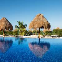 pool and 2 umbrella covers