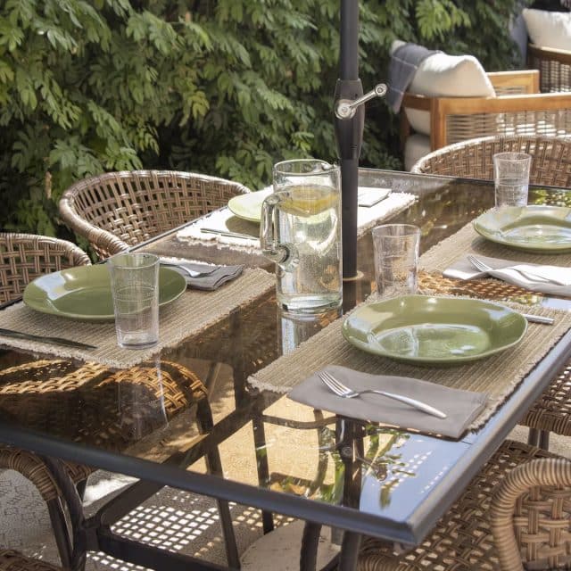 A patio table decked out for dining al fresco