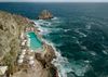 View of UNAHOTELS Capotaormina's private beach seen from above in Sicily