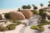 Shell-shaped villas curve organically along Nujuma’s shoreline