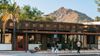 Strolling through Old Town South Scottsdale with a stunning mountain backdrop in Scottsdale, Arizona