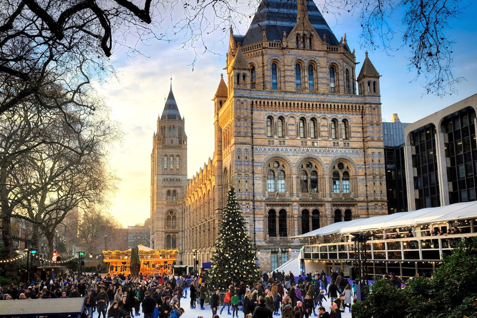 Ice skating rink and Christmas tree outside London's Natural History Museum