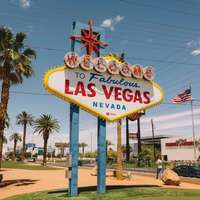 A brightly coloured neon sign welcomes visitors to Las Vegas, Nevada